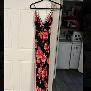 Black and pink flowered cross back jumpsuit